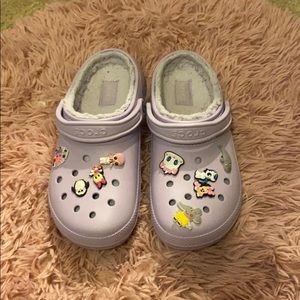 purple furry crocs